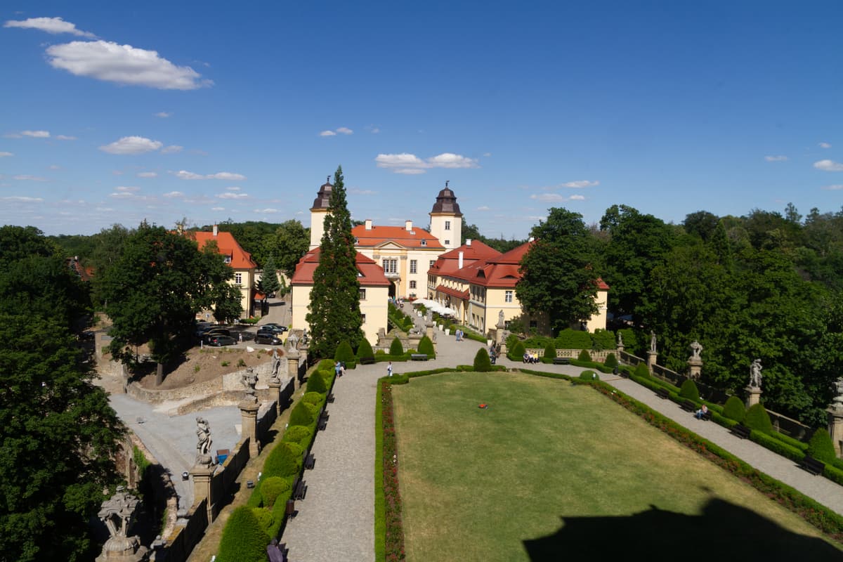 Książ Castle rising above the forested Pełcznica gorge in Wałbrzych, with its baroque terraces below the towers